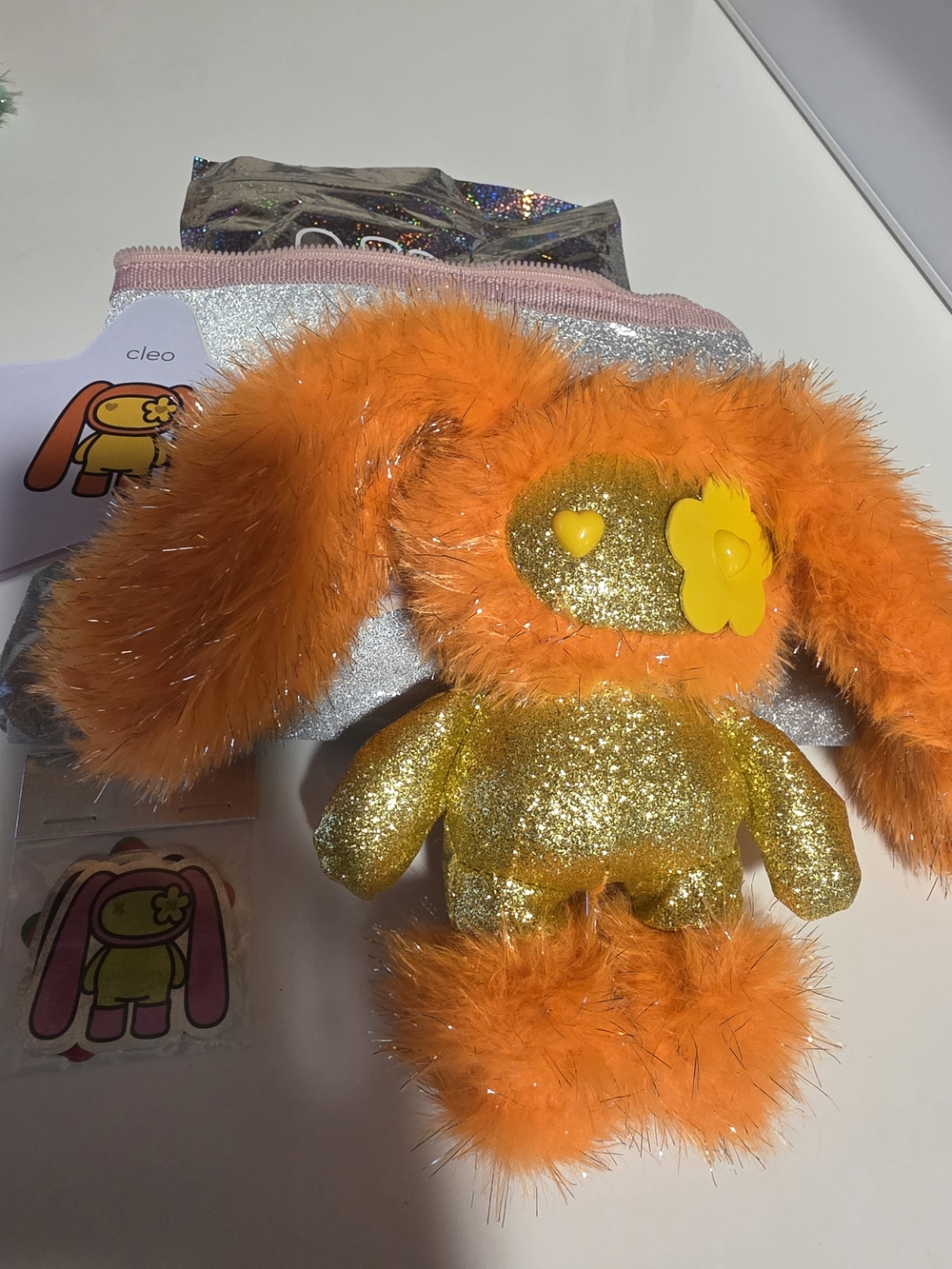 JuJu cleo Orange & Gold Glitter Plush CJ Hendry with Flower Accent